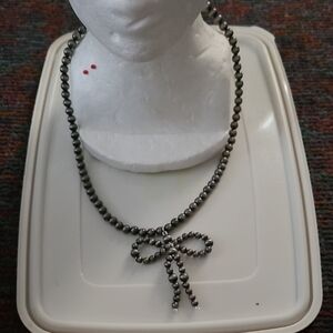 Chic Black Beaded Necklace with Bow